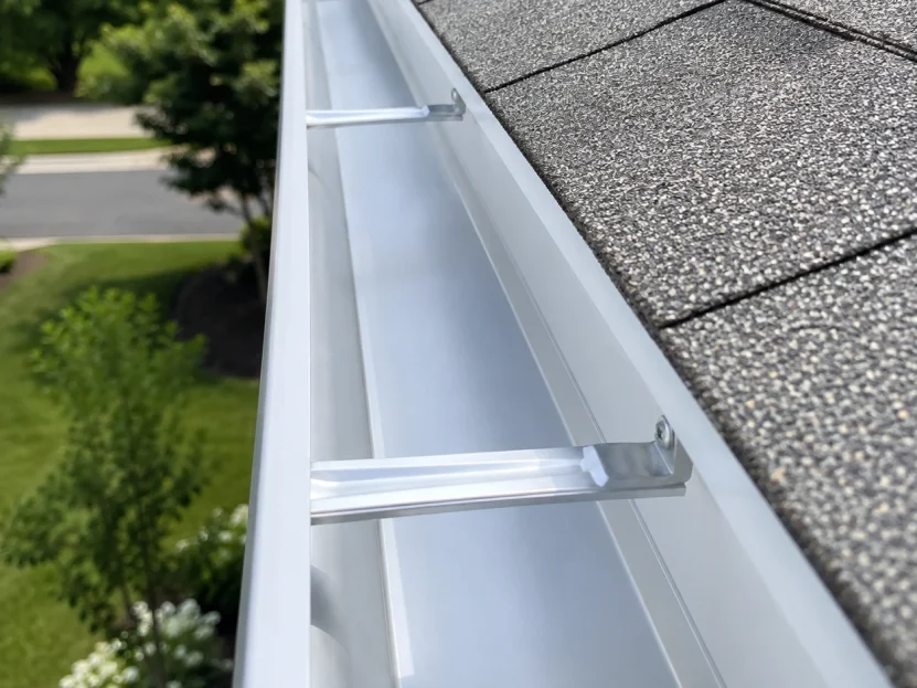 Close-up of a clean gutter along a roofline