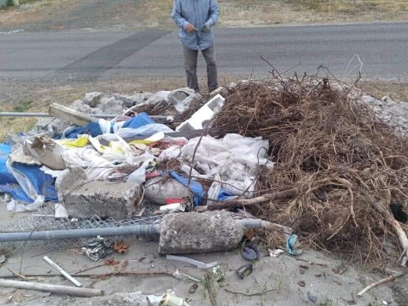 Pile of junk debris staged for removal